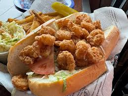 Flying Fish Public Market & Grill signature dishes Fish Market Sandwich
Fried Shrimp Po-boy
Seared Ahi Tuna Salad
